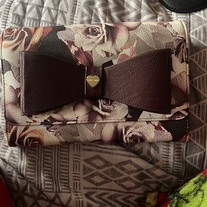 Selling a brand new Betsy Johnson. Floral style everything included